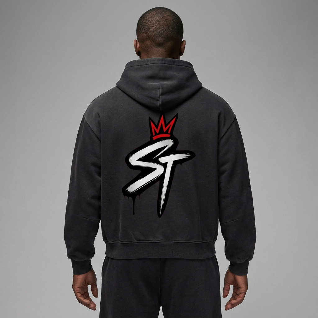 Back close-up of model wearing Concrete Vintage Black hoodie with matching Foundation pants
