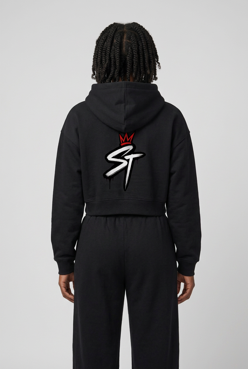 Back view of woman wearing First Light Jet Black cropped hoodie with original crowned ST logo and matching pants