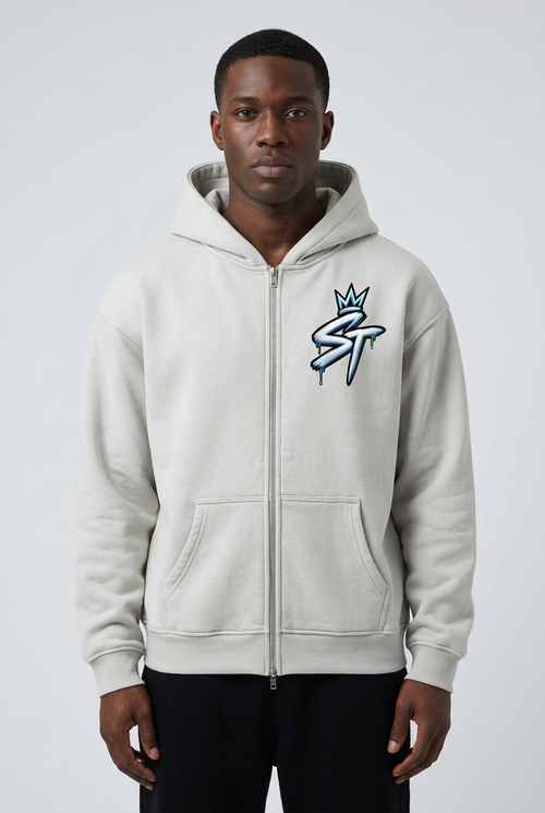 Male model wearing the Cold Front Zip in Ash Gray with original icy crowned ST chest artwork