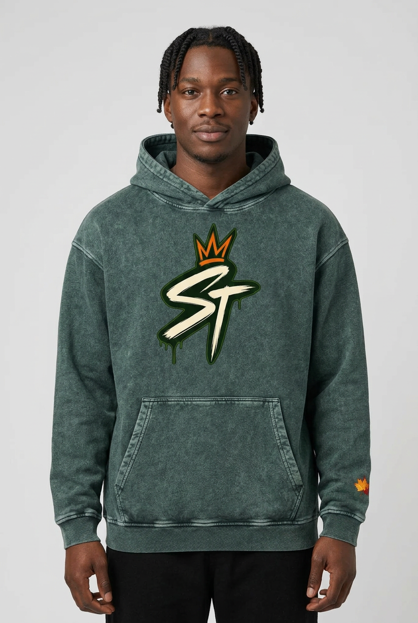 Front view of male model wearing Harvest Hoodie in Forest Green and Burnt Orange