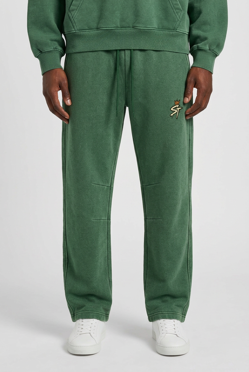 Front close-up of Groundwork Forest Green pants on model wearing matching hoodie