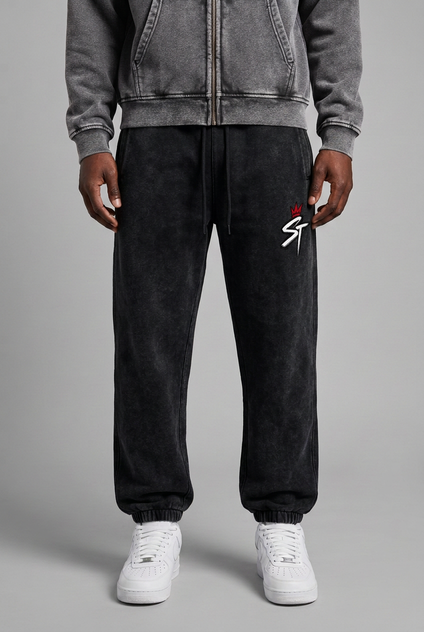 Front close-up of dark black ash-wash After Hours joggers with lighter charcoal hoodie