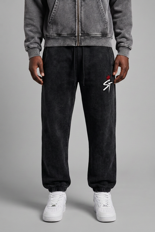 Front close-up of dark black ash-wash After Hours joggers with lighter charcoal hoodie