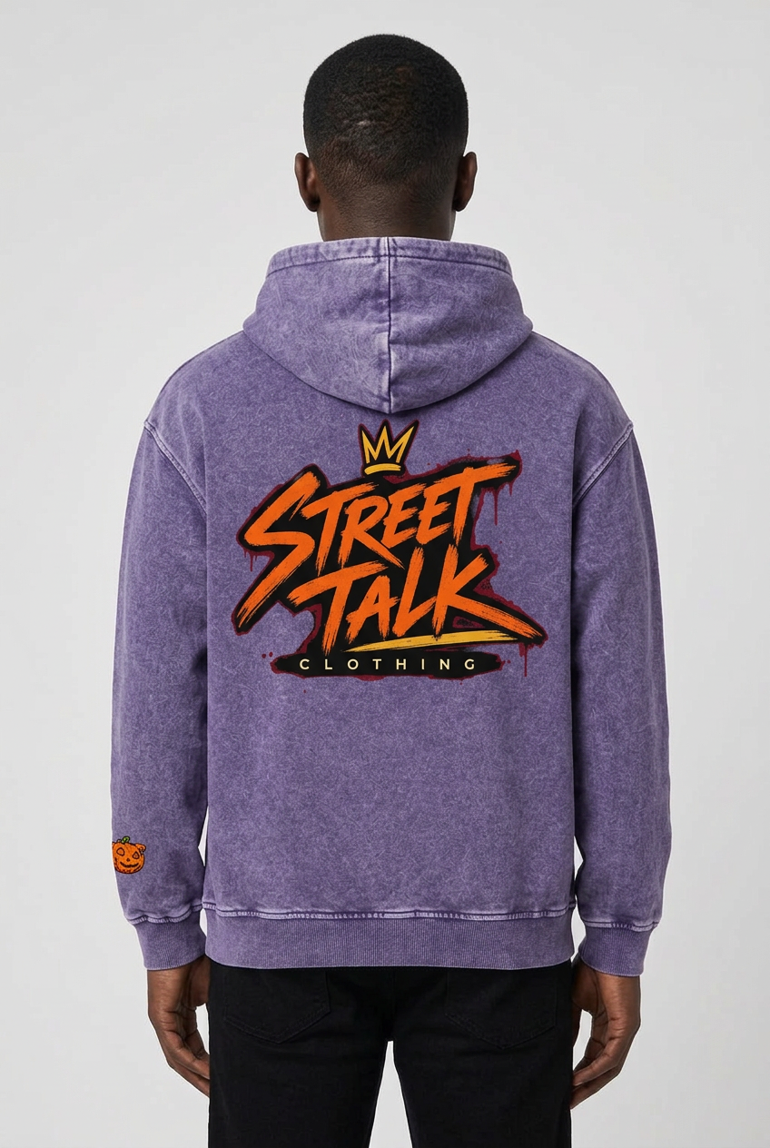 Back view of the same male model wearing Nightfall Hoodie with original orange Street Talk Clothing artwork