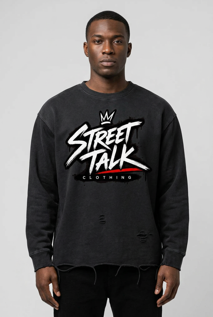 Male model wearing the Foundation Tee in Washed Black with original Street Talk Clothing chest artwork and distressed raw hem