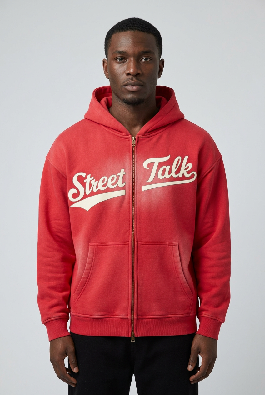 Male model wearing the Pressure Zip in Statement Red with original cream Street Talk script