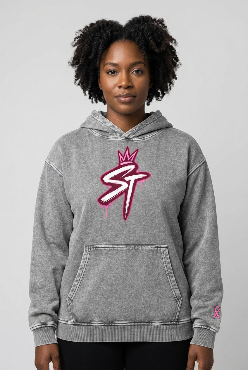 Female model wearing Strength Hoodie in Frost Gray and Pink