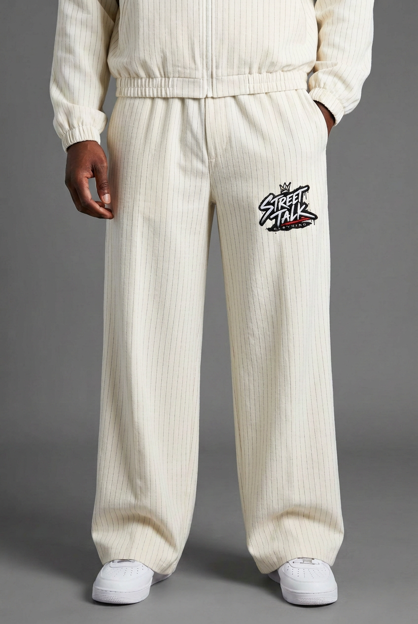 Corrected front model close-up of Bone wide-leg trousers with natural drape and no pressed center crease