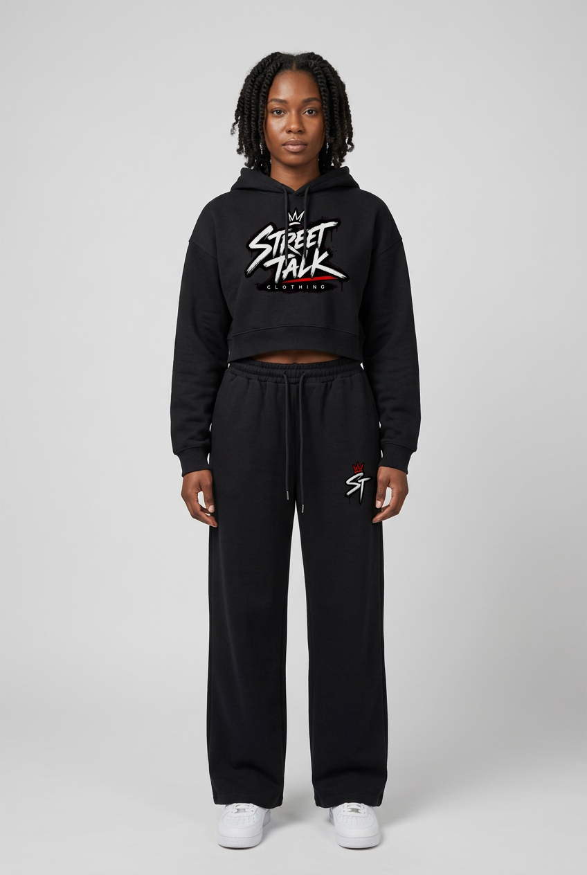 Model wearing the First Light cropped hoodie and matching Jet Black pants