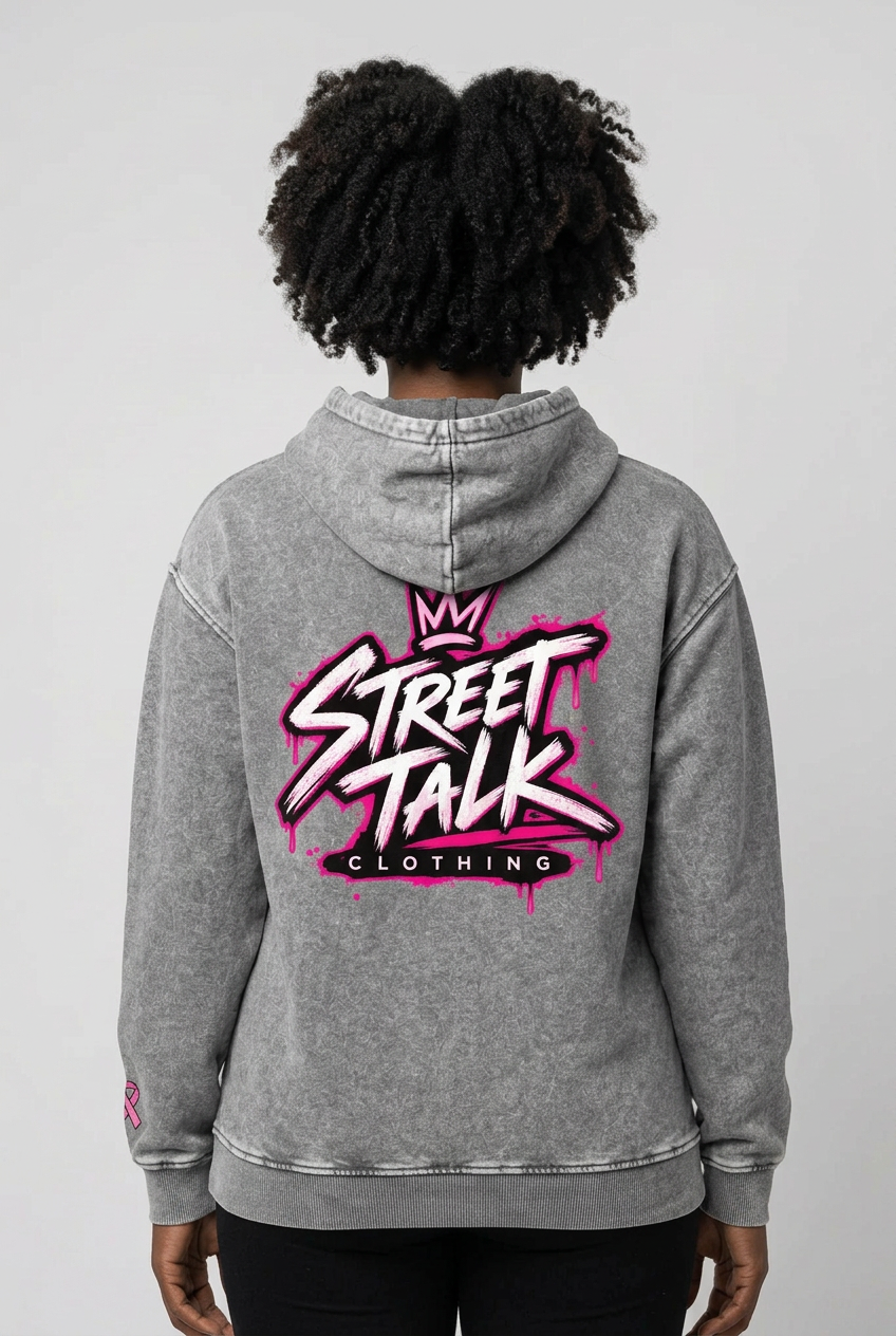 Back view of female model wearing Strength Hoodie with original pink Street Talk Clothing back artwork
